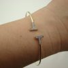 13807-2 Γυναικείο βραχιόλι σκληρό από κίτρινο χρυσό Κ9 με ζιργκόν