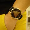 Unisex ρολόι GUESS με μαύρο καουτσούκ λουρί